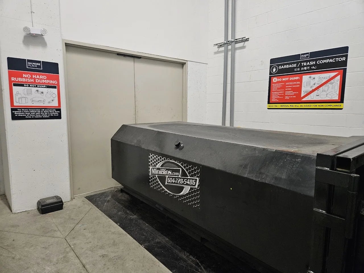 Garbage room — trash compactor