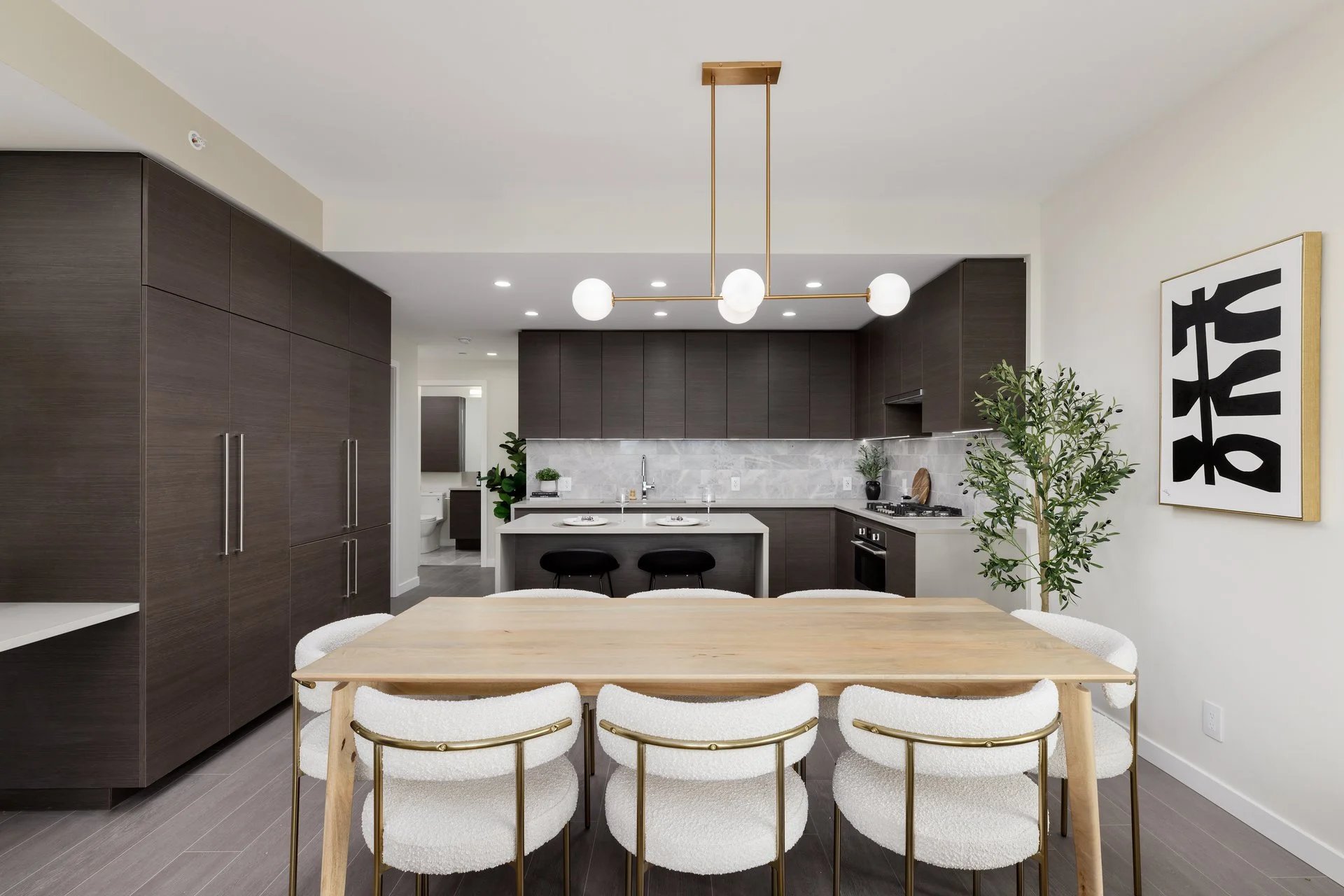 Kitchen and dining area in a Gilmore Place suite