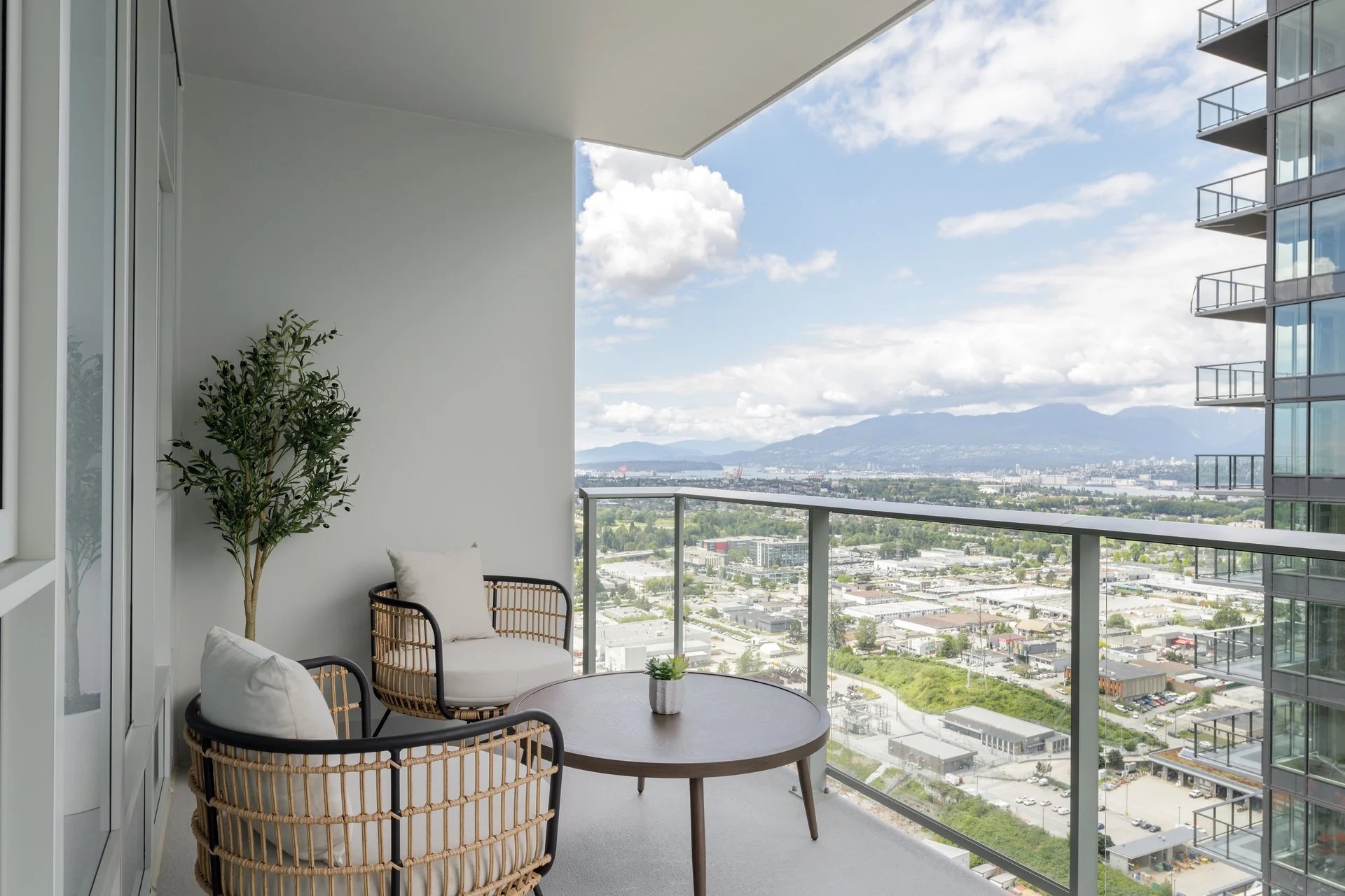 Furnished Gilmore Place balcony overlooking the city and mountains